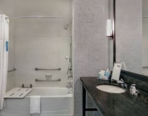 Guest bathroom with shower at Hampton Inn & Suites Austin @ The UniversityCapitol.