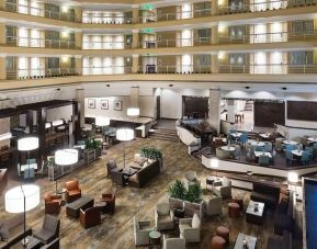 Lobby and coworking space at Embassy Suites By Hilton Denver Tech Center.