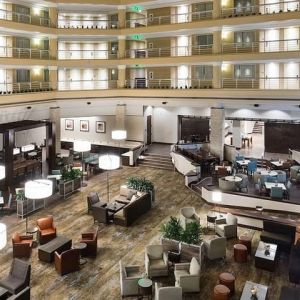 Lobby and coworking space at Embassy Suites By Hilton Denver Tech Center.