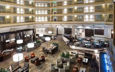 Lobby and coworking space at Embassy Suites By Hilton Denver Tech Center.