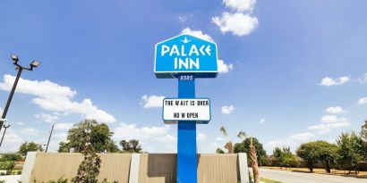 Hotel signage at Palace Inn Blue Laura Koppe Rd.