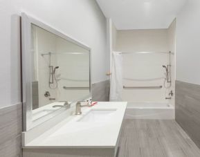 Guest bathroom at Baymont By Wyndham Houston Hobby Airport.