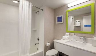 Guest bathroom with shower and tub at Hampton Inn & Suites Ft. Lauderdale Airport/South Cruise Port.
