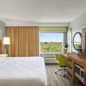 Day use room with work desk and natural light at Hampton Inn & Suites Ft. Lauderdale Airport/South Cruise Port.