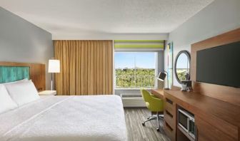 Day use room with work desk and natural light at Hampton Inn & Suites Ft. Lauderdale Airport/South Cruise Port.