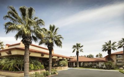 Hotel exterior and parking at DoubleTree By Hilton Ontario Airport.