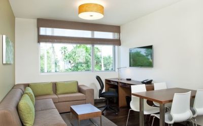 Day room with lounge area at Element Miami Doral.