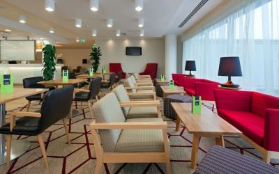 Lounge and dining area at Hampton By Hilton London Gatwick Airport.