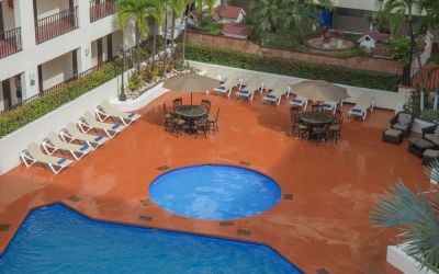 Bird's eye view of outdoor pool area at Hotel Delfin PV Beach Resort.