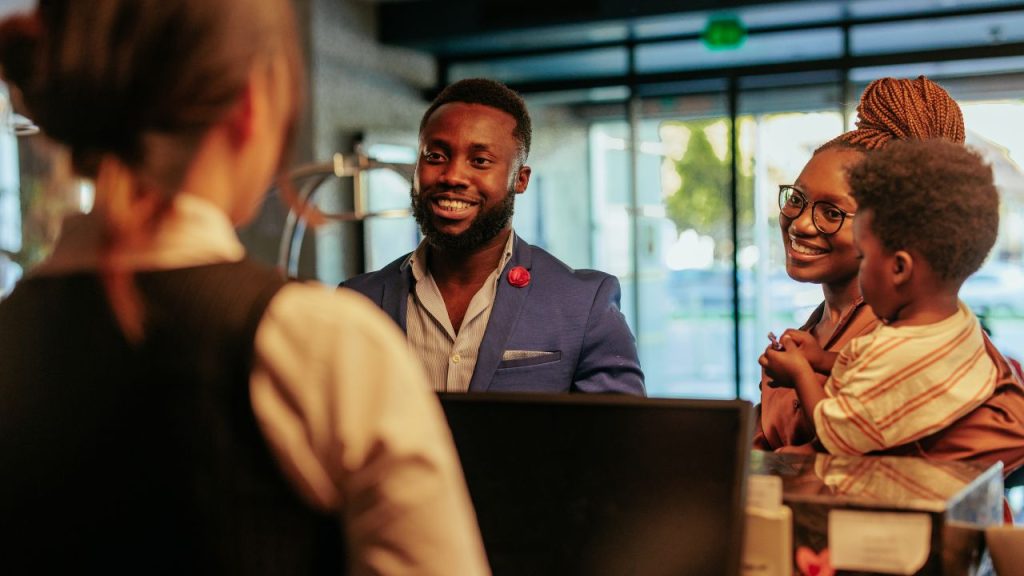family checking into a day use hotel