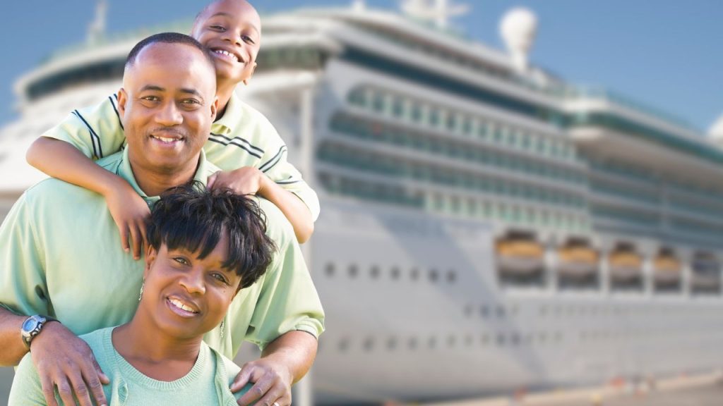 family of three disembarking from a cruise ship