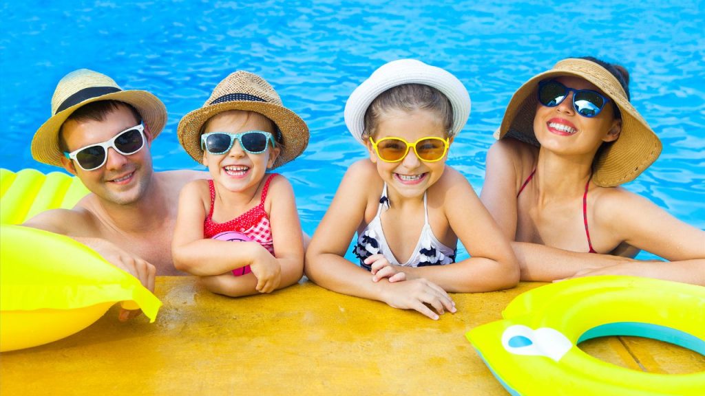 family enjoying a daycation in the pool fort lauderdale