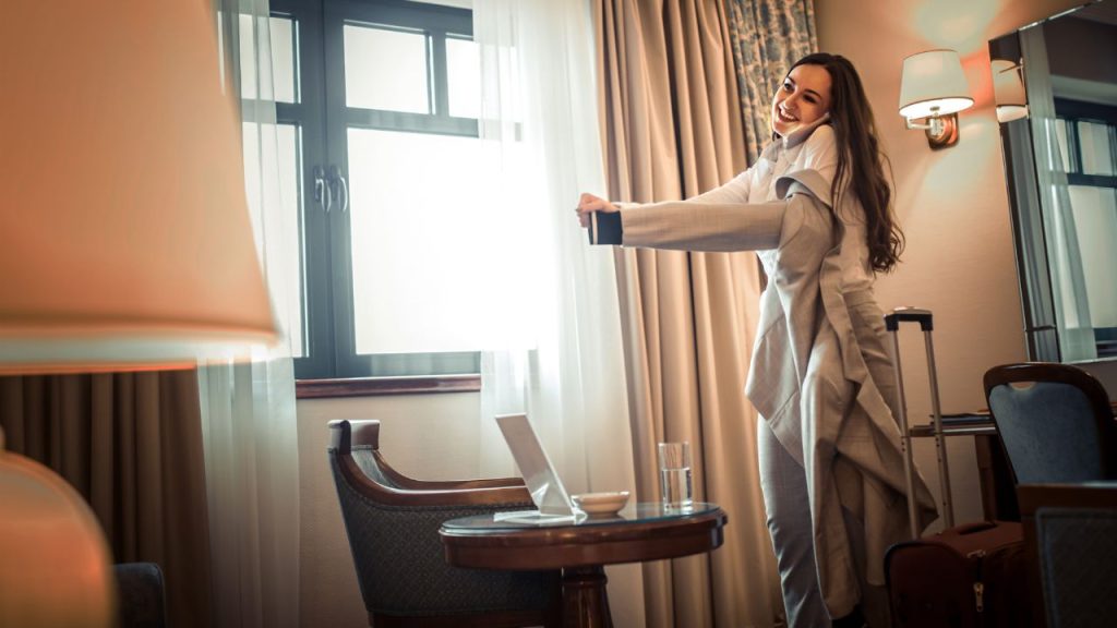 lady enjoying day use hotel room during layover