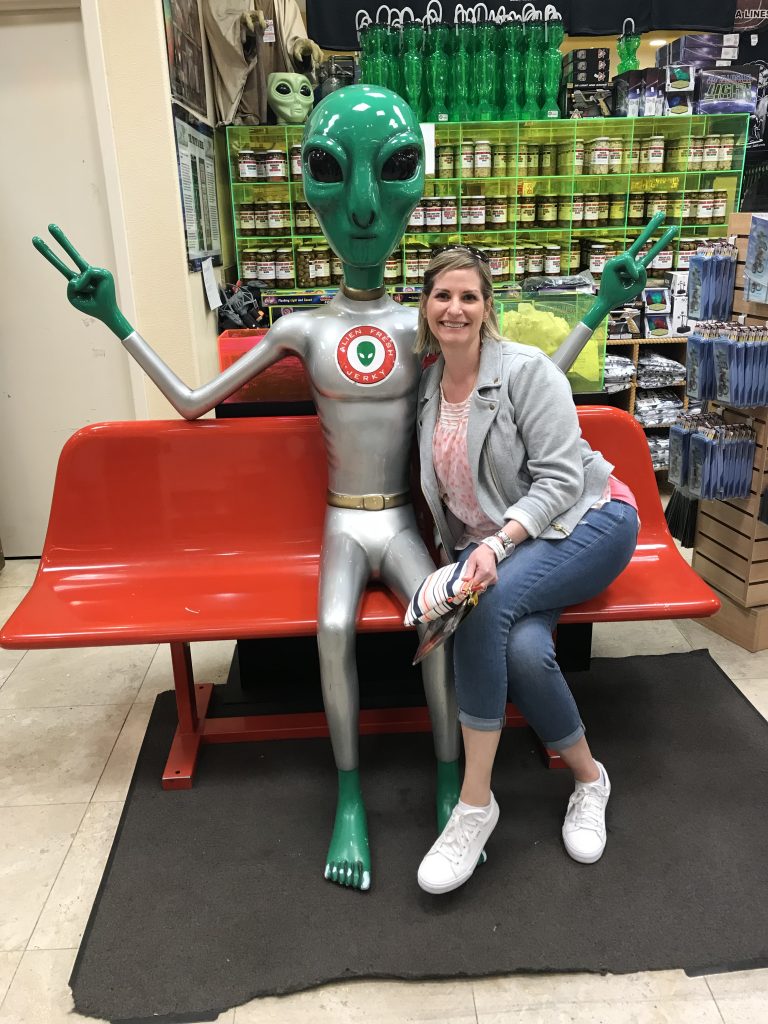 Author posing with an alien statue in a souvenir shop in Las Vegas.