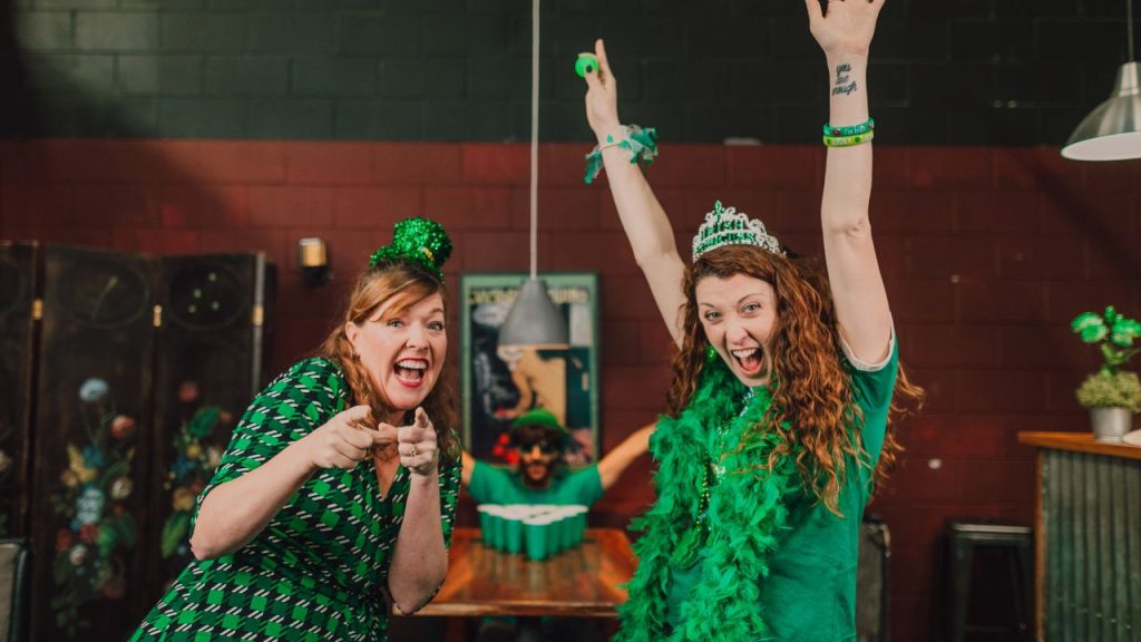 two ladies celebrating St. Patrick's Day in a pub