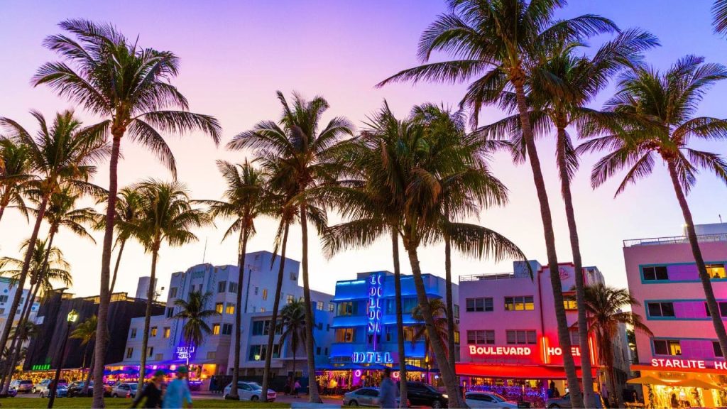 South Beach in Miami during spring break season with beachgoers and art deco hotels, one of the most popular spring break destinations for nightlife.
