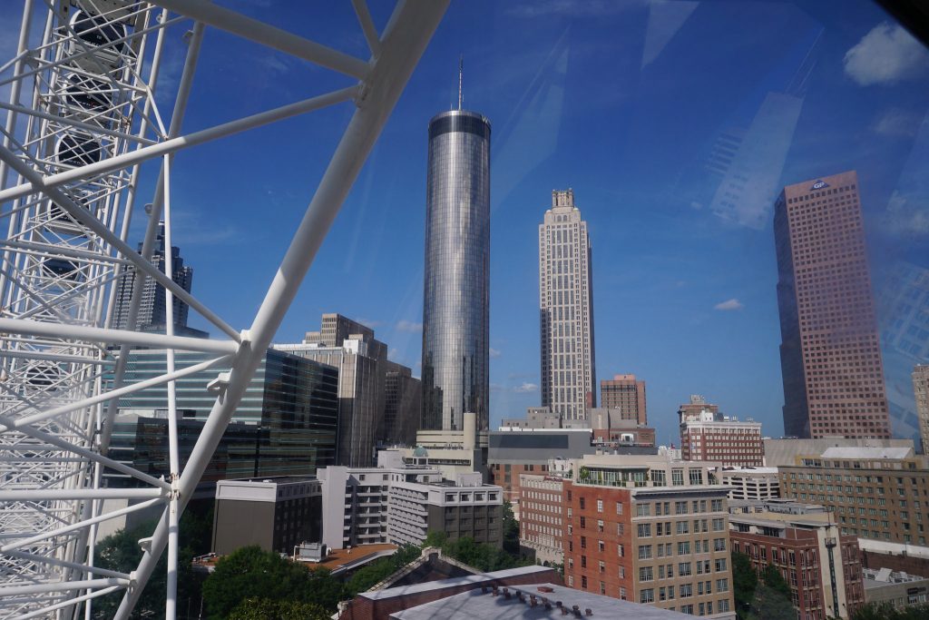 Riding the SkyView is a fantastic way to spend a day in Atlanta as evidenced by a view of downtown with a clear blue sky in the background.