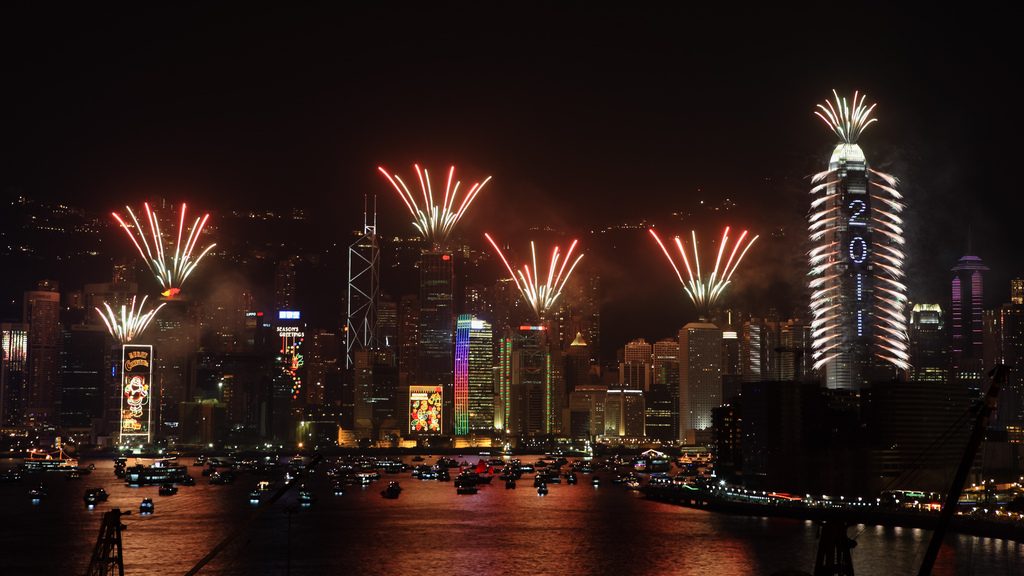 View of NYE fireworks in Hong Kong from water.