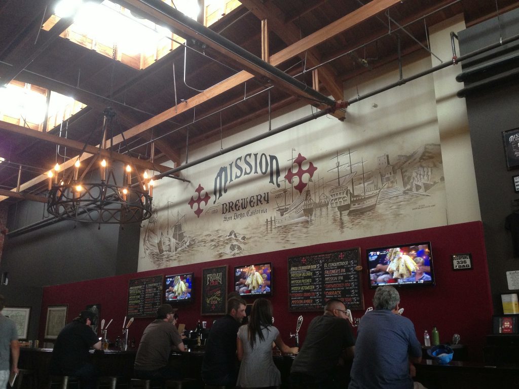 Wide open taproom inside Mission Brewery in San Diego, California, a perfect spot to grab a daytime brew.
