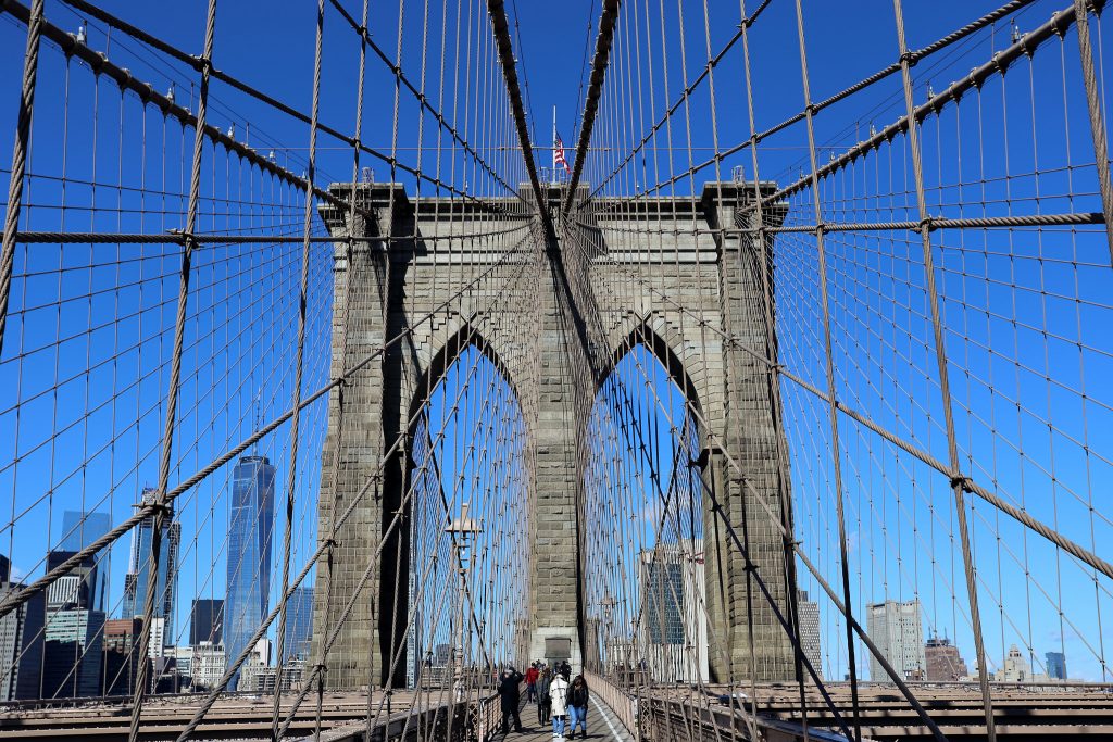 The Brooklyn Bridge with the Manhattan skyline backdrop