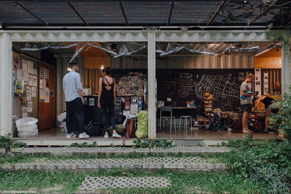 Check-in area of a hostel in Bangkok.