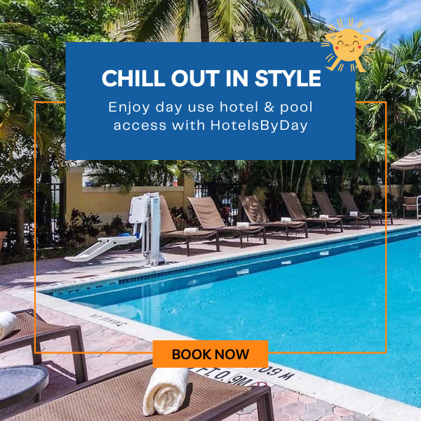 Tropical pool on a sunny day. Chill out in style with hotel day access.