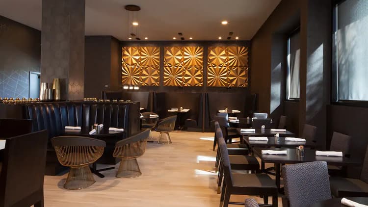 Sleek restaurant and lounge area of H Curio hotel in LA.