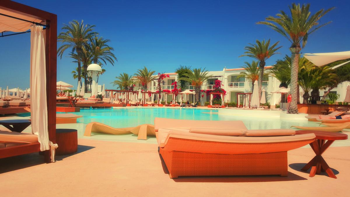 Luxury pool resort on a sunny afternoon, available on-demand